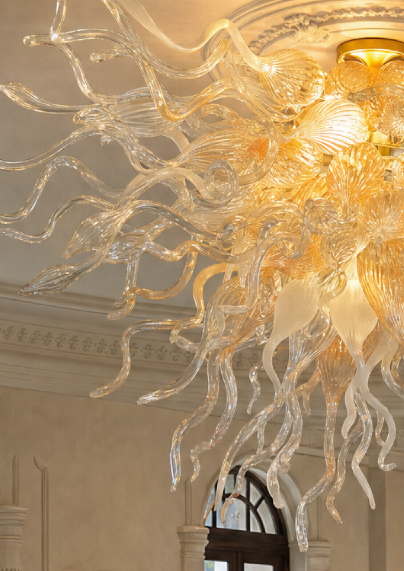 Luxurious glass chandelier with intricate design in a room setting