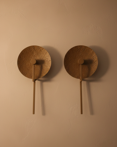 Aaranya Halo Wall Light Handcrafted Solid Brass Designer Wall Sconce | Made in India Two wooden wall hooks on a beige wall