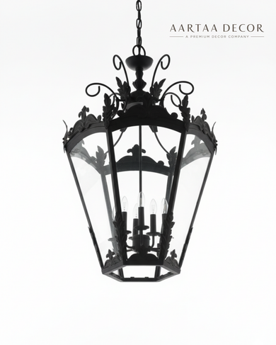 Decorative black lantern with intricate designs on a white background, featuring the brand 'Aartaa Decor'.