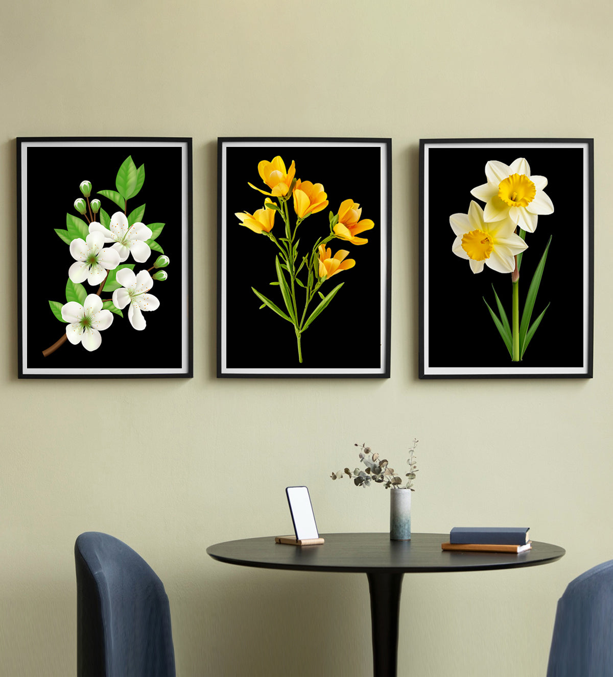 our Flora Elegance Trio - an exquisite collection of botanical art that captures the essence of floral elegance. This set includes three meticulously crafted paintings that bring to life the vibrant hues and intricate details of eucalyptus branches, lush pink roses, and cheerful yellow daffodils. Each piece is framed in sleek black to accentuate its visual appeal, making it an ideal addition to any decor seeking a touch of natural sophistication.