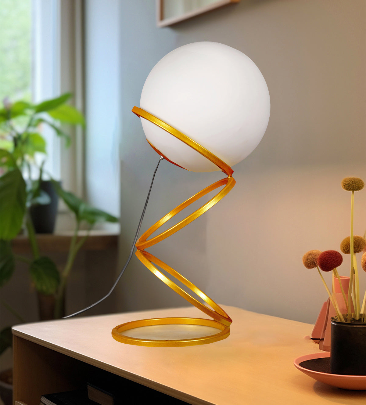 Enhance your space with the Luna Glow Modern Milky Glass LED Table Lamp. This sleek, gold spiral base with a soft-glowing glass globe adds elegance to any room. Shop now for cozy, energy-efficient lighting - Aartaa decor