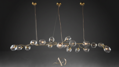 Detail view of Golden Blossom Branch Chandelier – brass branch structure with hand-blown glass bud shades, luxury modern chandelier by Aartaa Decor.