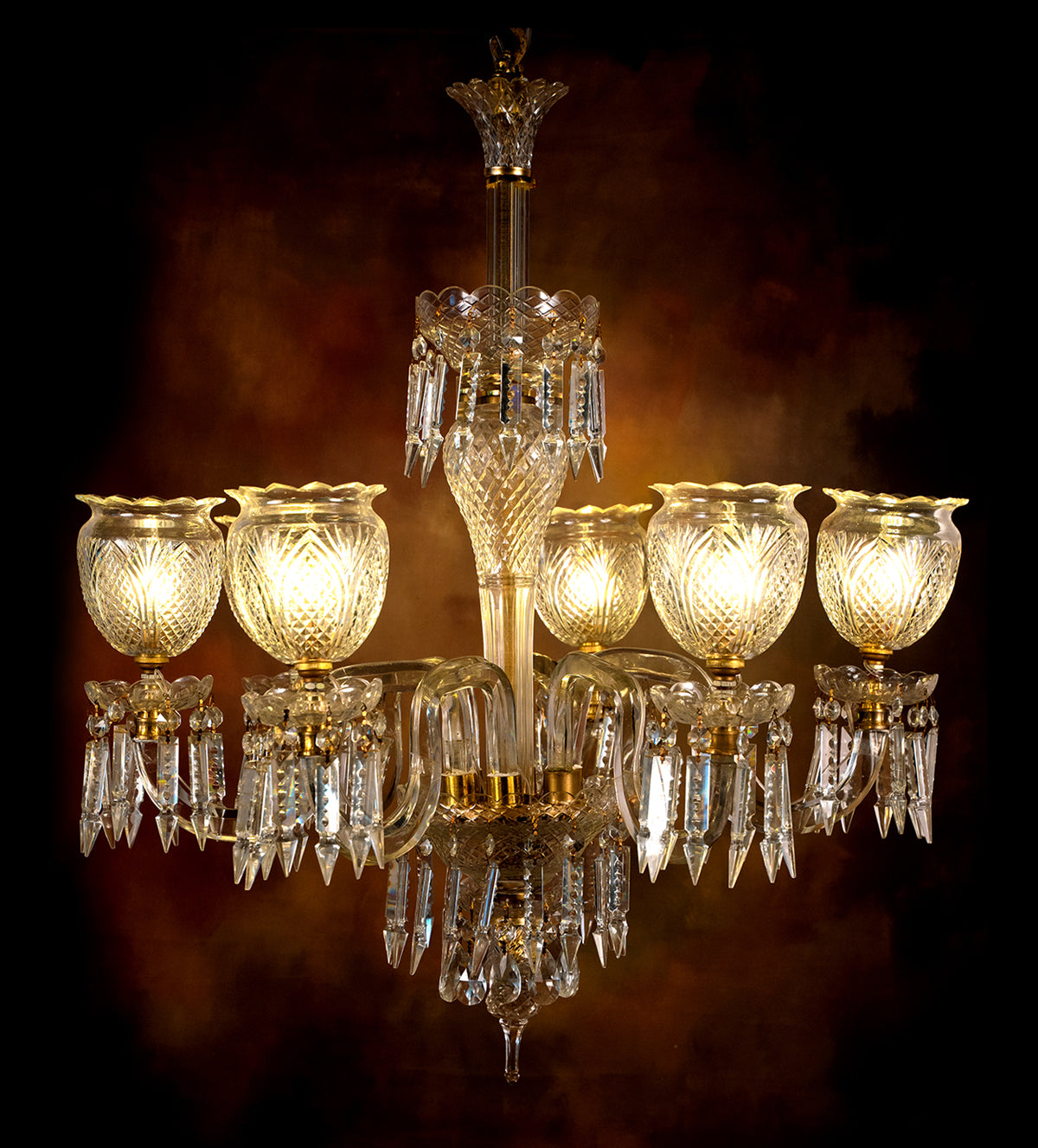 With our Maharaja's Heritage Crystal Chandelier, you may enter a luxurious era. Inspired by royal Indian palaces, this magnificent painting captures the opulence of life in the royal court. Each expertly crafted crystal sparkles with ageless beauty as it refracts light to create captivating patterns that move around your room. The rich gold accents add an air of grandeur to the elaborate design, which is reminiscent of old-world artistry. 