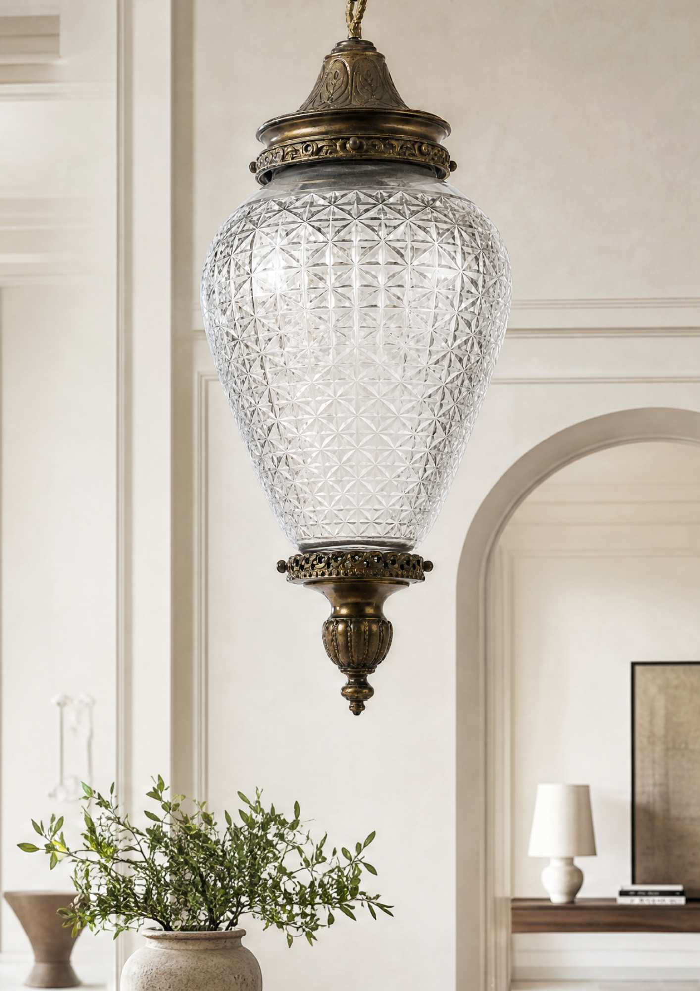 Decorative hanging light fixture in a room with a mirror and plant.