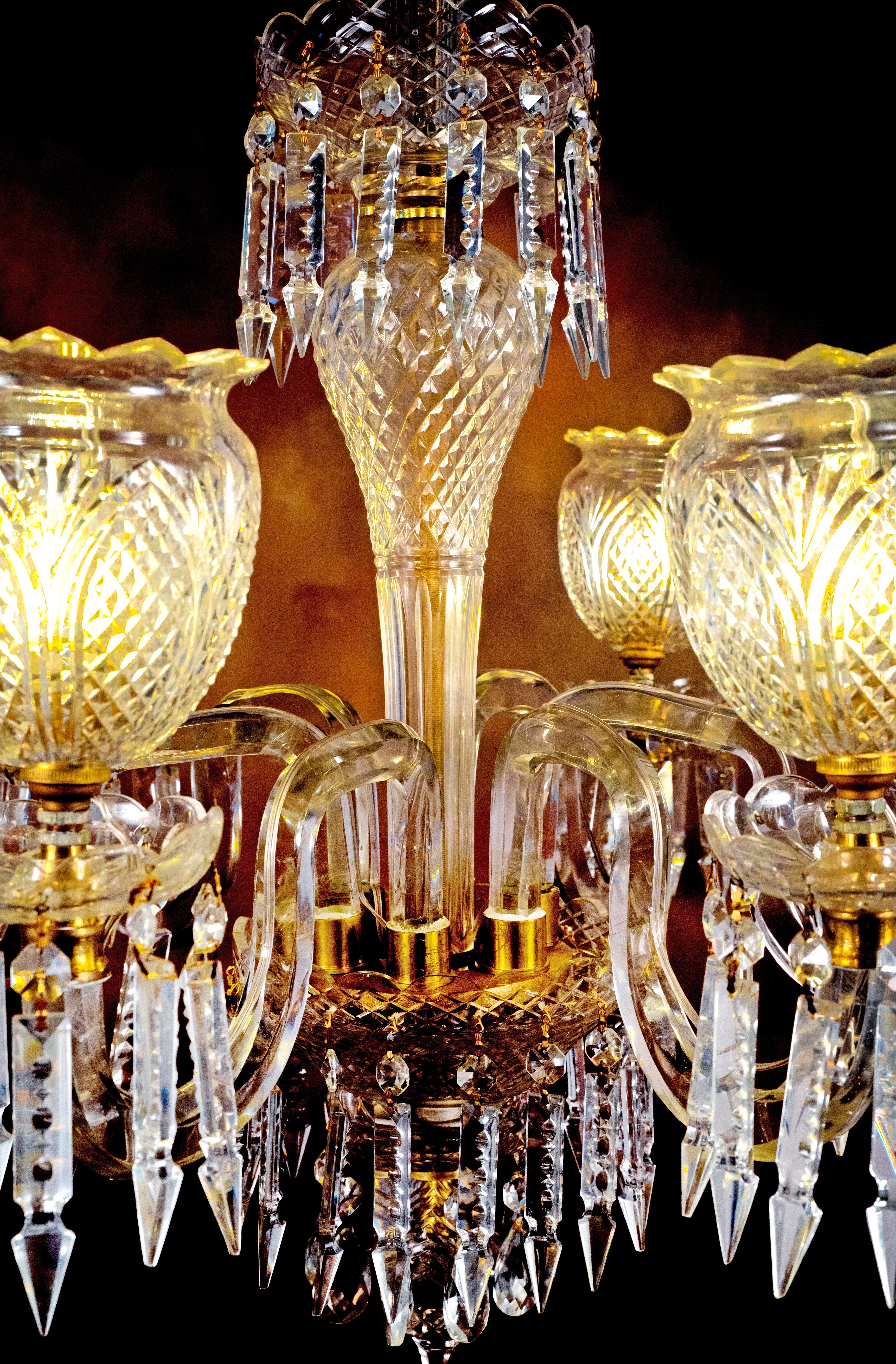 With our Maharaja's Heritage Crystal Chandelier, you may enter a luxurious era. Inspired by royal Indian palaces, this magnificent painting captures the opulence of life in the royal court. Each expertly crafted crystal sparkles with ageless beauty as it refracts light to create captivating patterns that move around your room. The rich gold accents add an air of grandeur to the elaborate design, which is reminiscent of old-world artistry.