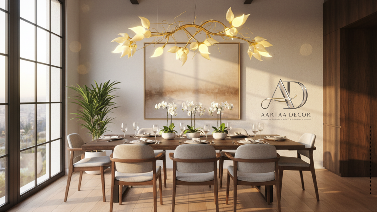 Dining room with a large wooden table, chairs, and a decorative chandelier. Vanshika Bloom Vine Chandelier – Handcrafted Brass Floral Sculpture Light