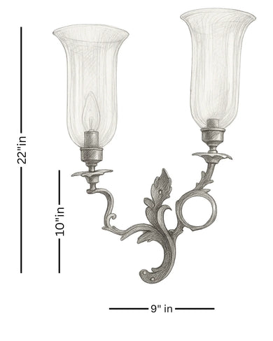 Decorative wall sconce with two glass shades and measurements on a white background